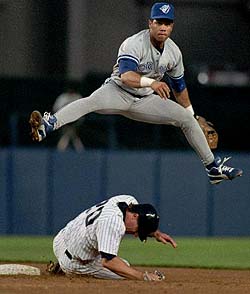 Roberto Alomar turning the double play