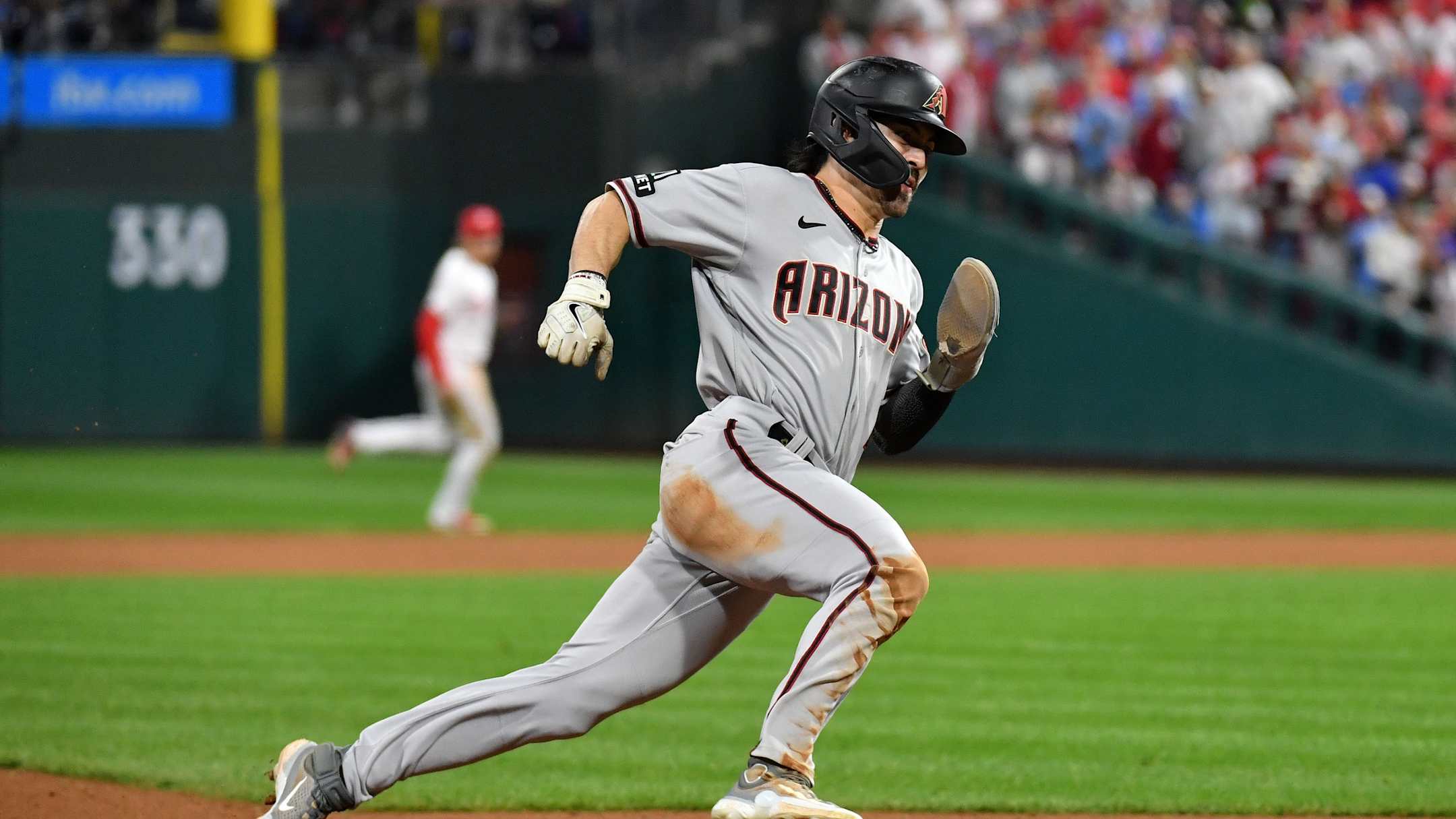 Corbin Carroll running around the bases